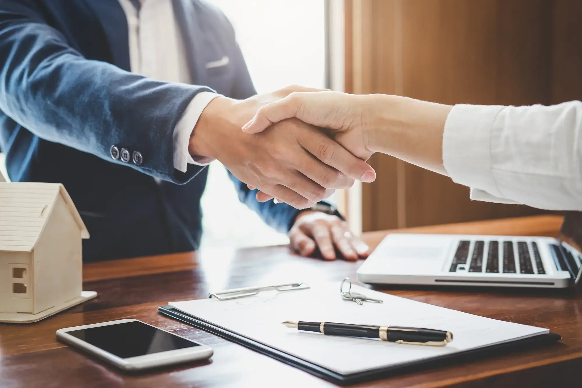 Handshake representing partnership